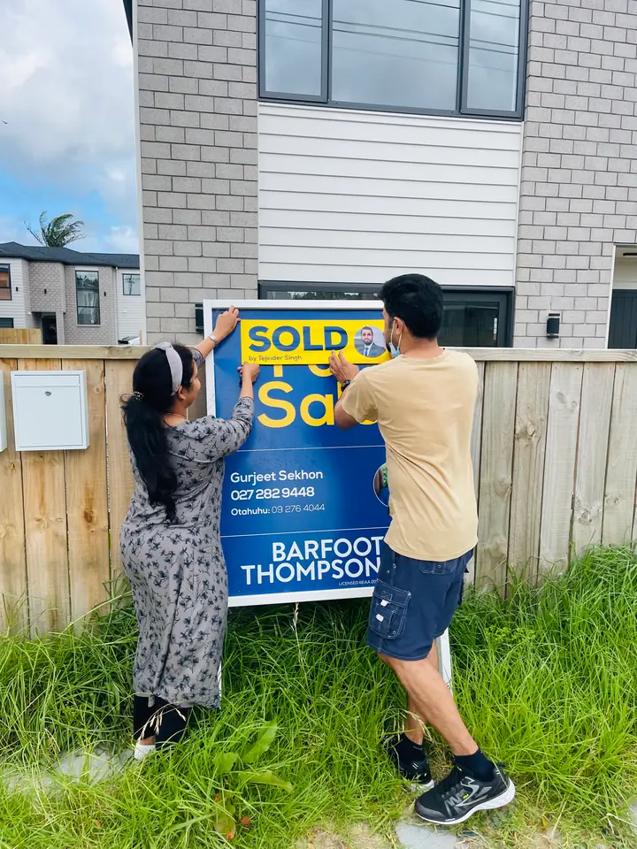 “SOLD by Tejinder Singh” goes up on a Gurjeet Sekhon sign